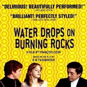 Fotoğraf Water Drops on Burning Rocks